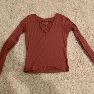 Long sleeve tight fitting cropped tee